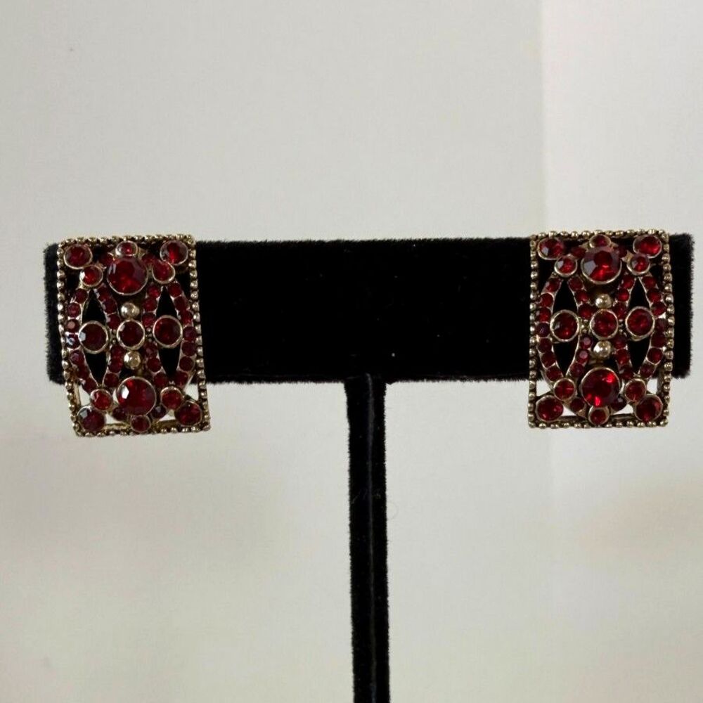 Vintage Monet Ruby Red Rhinestone Clip On Earrings Gold Tone Signed